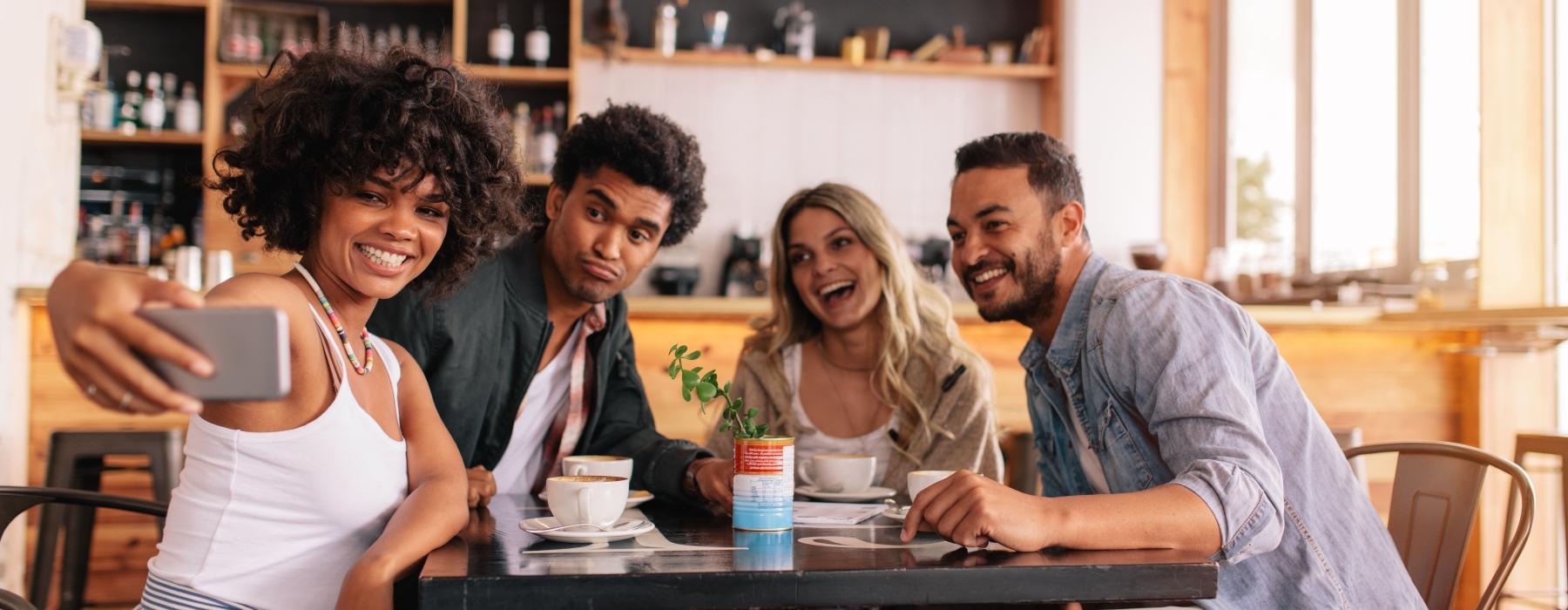 a group of people sitting around a table